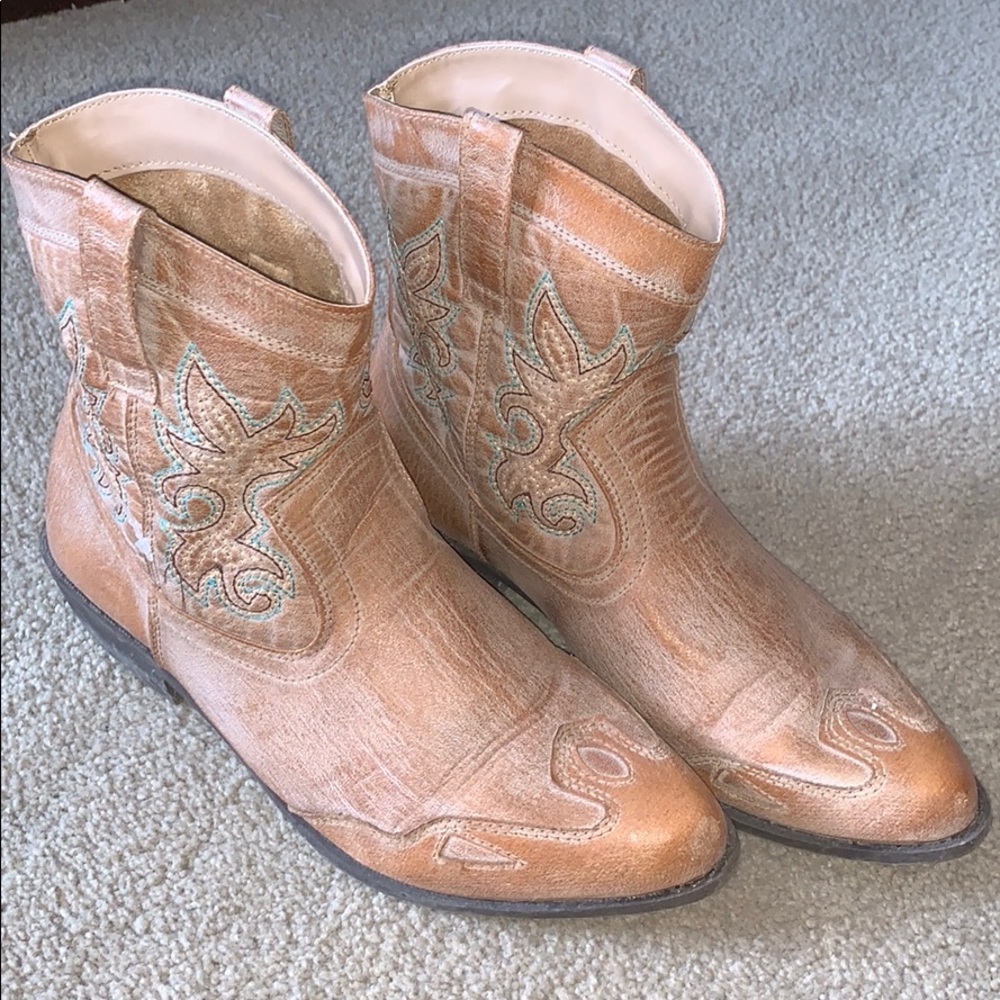 Distressed cowgirl boots